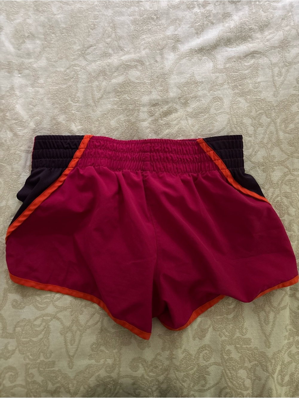Nike Women's Fuchsia Athletic Shorts with Orange Trim